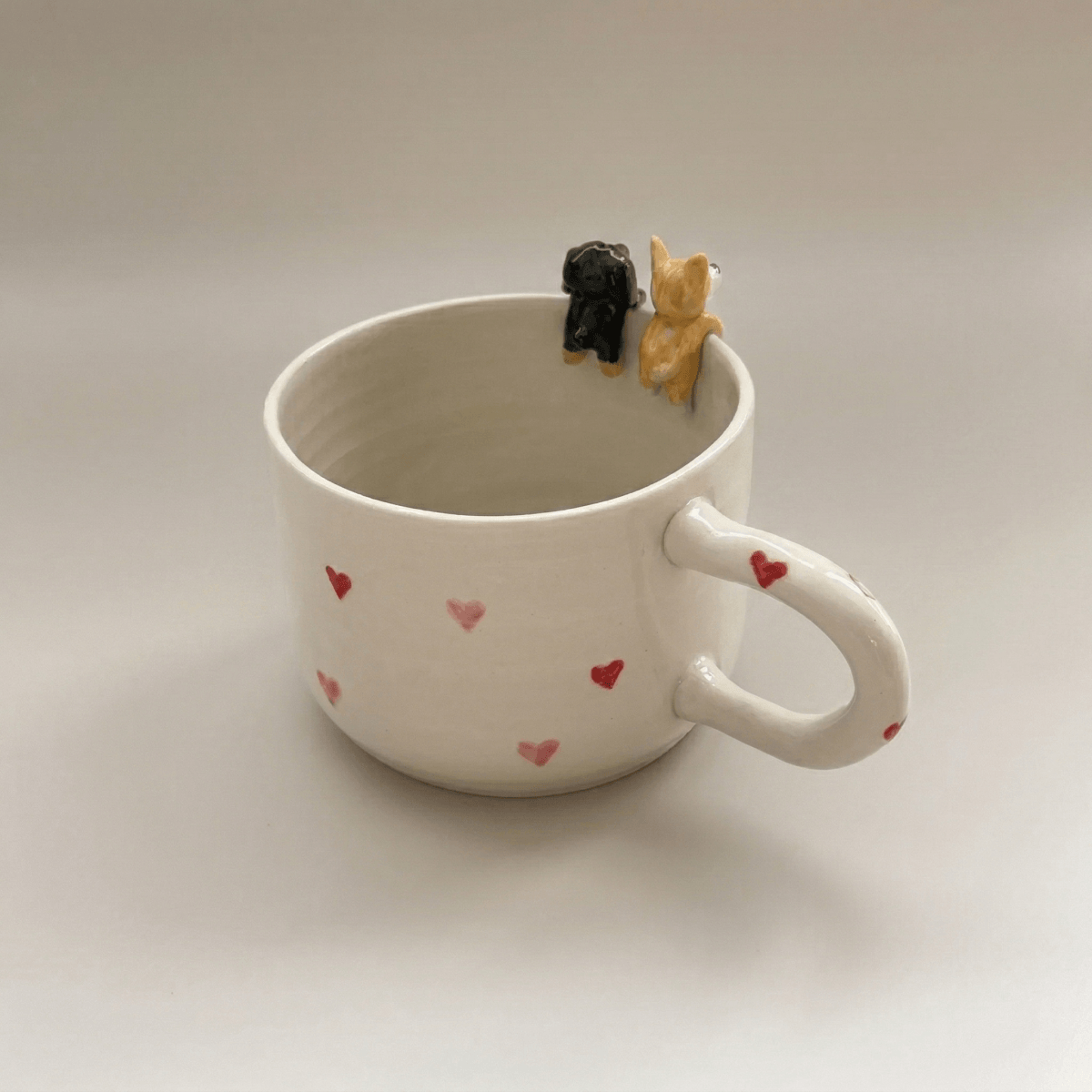 Custom pet Mug with two dog figurines and names 'Oreo' and 'Luna' on a light background