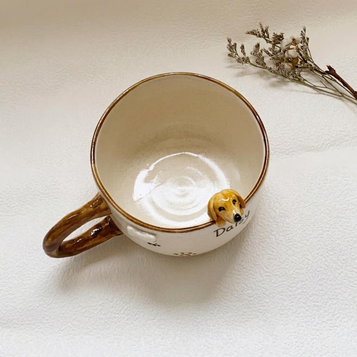 Mug with a dog design on a white surface