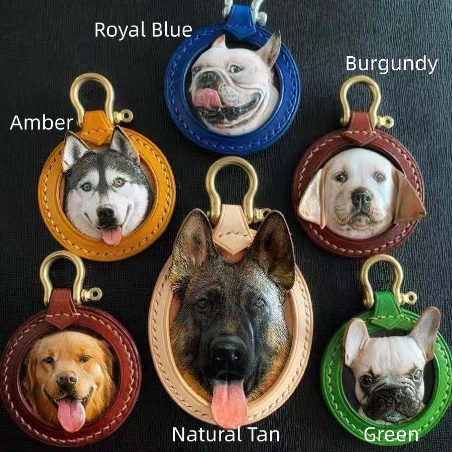 Keychains with dog portraits in various colors on a dark background