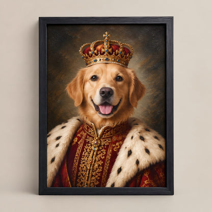 A framed custom pet portrait of a golden retriever dressed as a king, wearing a gold crown and a red royal robe with white fur trim, set in a black frame against a neutral beige wall.