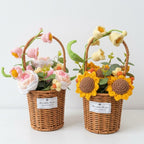 Two woven baskets with crocheted flowers on a white background