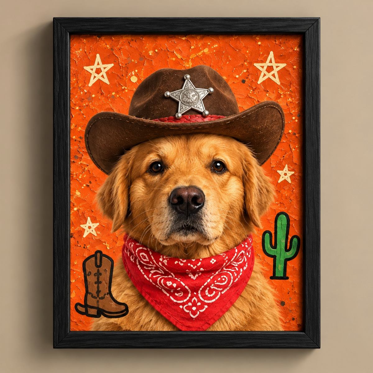 A framed pet portrait print featuring a golden retriever dressed as a cowboy with a brown hat, red bandana, orange textured background, and western star/cactus motifs, displayed against a beige wall.