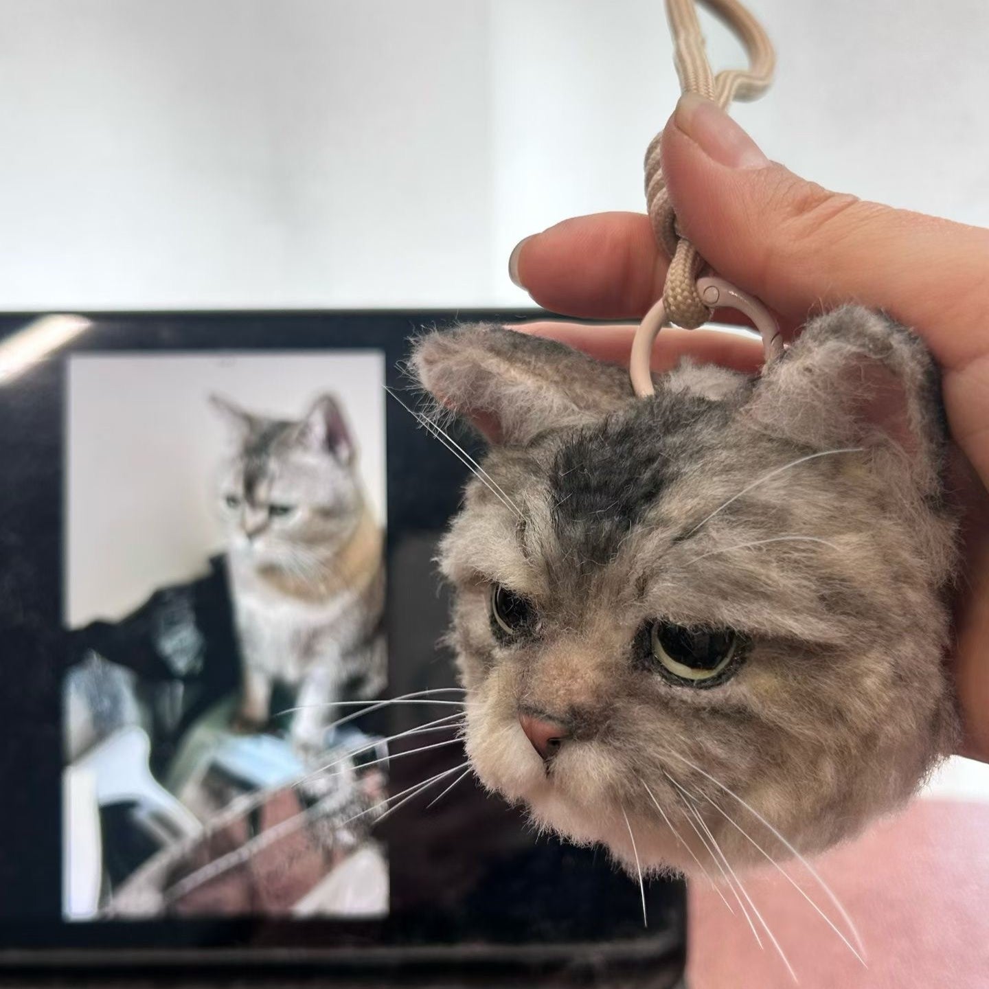 Custom Cat Replica Keychain with a blurred background