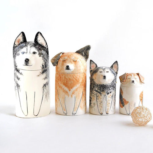 Set of TimoPaw Custom pet ceramic dog-shaped containers on a white background